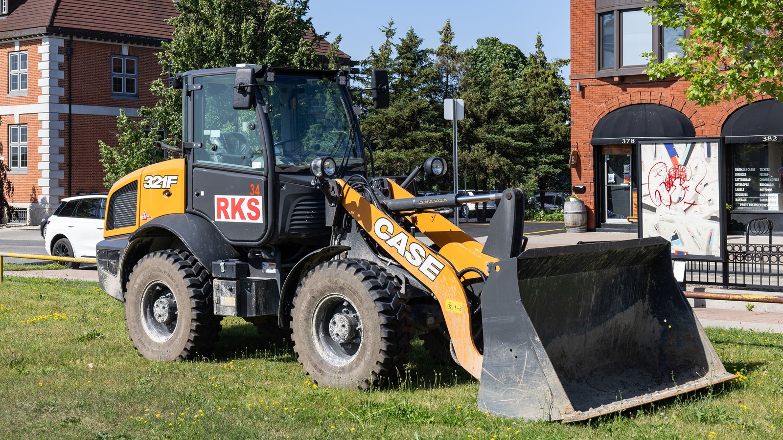 Compact wheel loader parked on a working yard